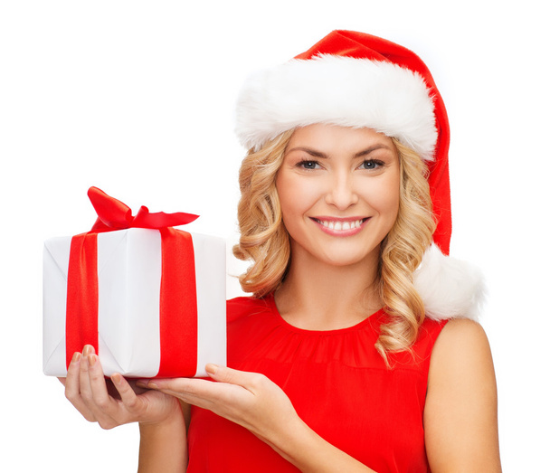 Smiling woman in santa helper hat with gift box - Foto, afbeelding