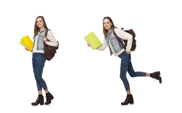 Bastante estudiante sosteniendo libros de texto aislados en blanco - Foto, Imagen