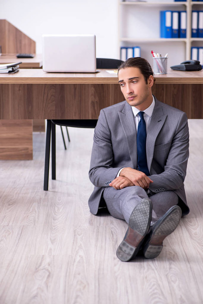 Unhappy male businessman in the office - Photo, Image