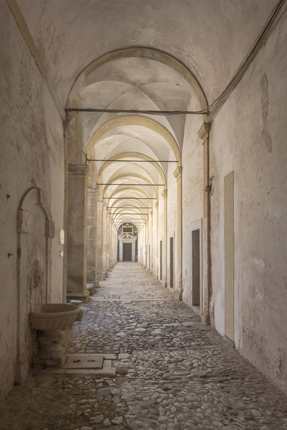 summer light under San Lorenzo Certosa cloister covered walkway  - Photo, Image