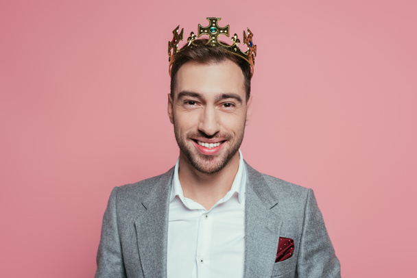 portrait of happy bearded man in crown and suit, isolated on pink - Φωτογραφία, εικόνα