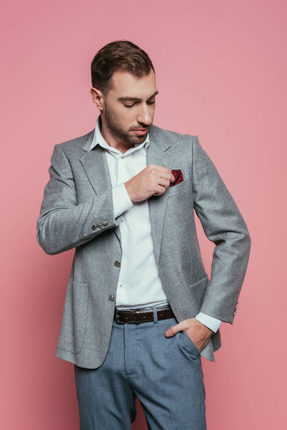 handsome bearded man in grey suit, isolated on pink - Foto, Imagem
