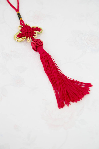 Kiinalainen onnekas punainen solmu tapetti
 - Valokuva, kuva