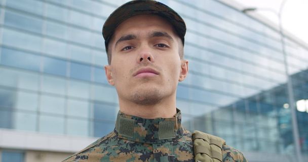 Close up portrait of young soldier. - Fotó, kép
