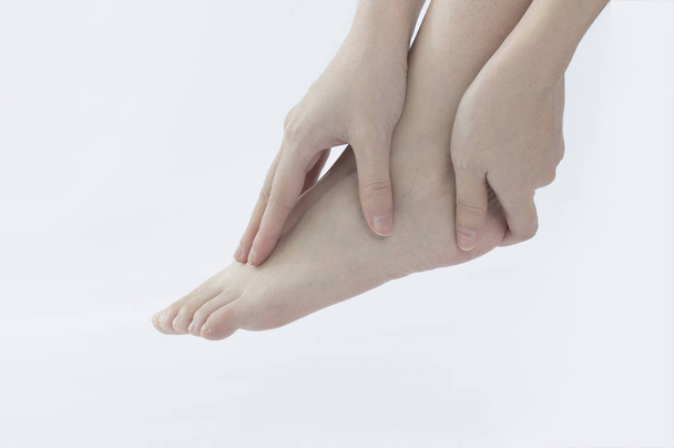 closeup of female foot and hands on floor, close up - Фото, изображение