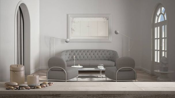Klasik minimalist oturma odası, koltuklar ve kanepe, kahve masası, iç mimari tasarım üzerine, üzerinde mumlar ve çakıl taşları olan ahşap bir masa veya raf. - Fotoğraf, Görsel