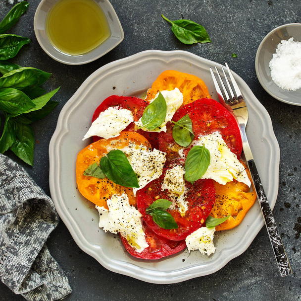 salad of tomato, mozzarella and basil. Italian food. - Fotografie, Obrázek