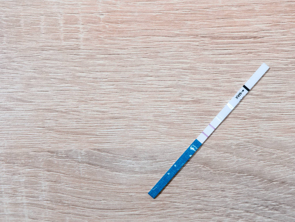 A pregnancy test showing a positive result. copy space - Fotoğraf, Görsel