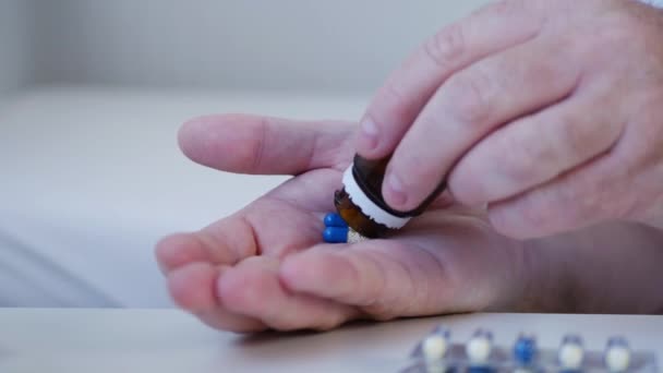 Sick Man Put in His Hand Pills from a Medical Recipient - Filmagem, Vídeo
