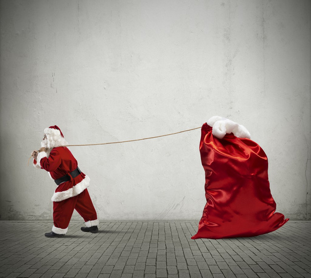 Santa Claus con gran saco
 - Foto, Imagen
