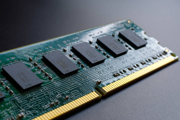 Computer RAM Random Access Memory modules are located diagonally on a black background for the image of technological progress, development, electronic design. Selective focus - Photo, Image