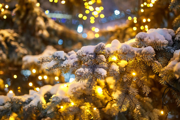 Christmas decorations on the street, colorful holiday bokeh lights, city night illumination - Φωτογραφία, εικόνα
