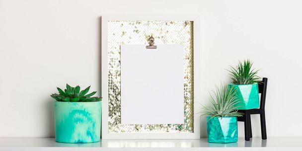 Lifestyle home decoration with frame with place for text and succulents - Photo, Image