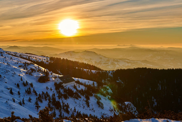 Aerial Landscape view from Ceahlu Mountains National Park,  at sunset in winter season,Sunset in Ceahlau Mountains - Fotoğraf, Görsel