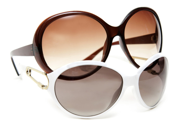 Two sunglasseses white and brown - Valokuva, kuva