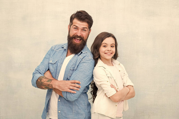 My dad is always there. Happy dad and adorable little daughter smiling on grey background. Bearded dad and small girl child wearing smiling in casual style. My dad is my love - Fotoğraf, Görsel