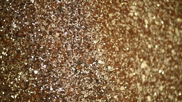 Fundo texturizado abstrato brilhante com luzes douradas, bokeh. Natal, conceito de ano novo. Fundo de ouro festivo
 - Filmagem, Vídeo