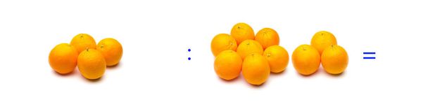 Divisão, operação matemática simples; divisão entre laranjas
 - Foto, Imagem