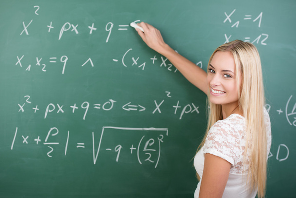 Clever confident female student in the classroom - Foto, Imagen