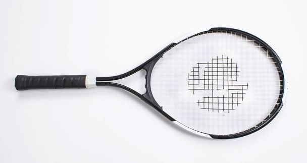 Single tennis racket isolated white background. Top view - Photo, Image