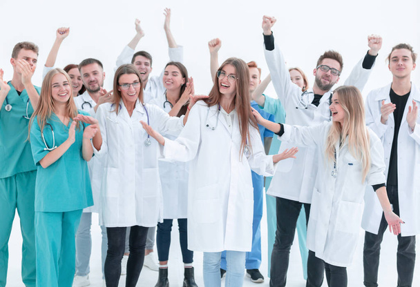 top view. a group of smiling doctors pointing at you. - Foto, Imagem