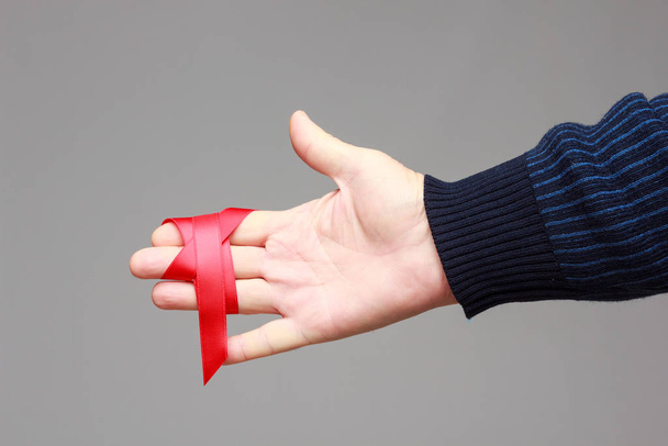 Red ribbon for gift wrapping - Fotó, kép