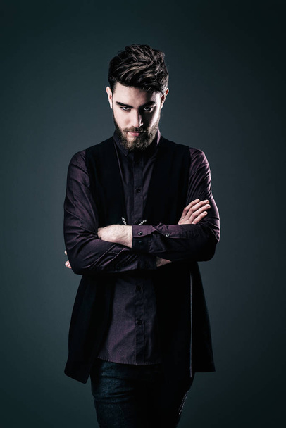 Young Hipster in Shirt and Gown, Arms Crossed, Looks at the Camera - Photo, image