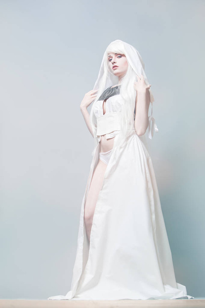  Nymph standing with a white dress - Zdjęcie, obraz