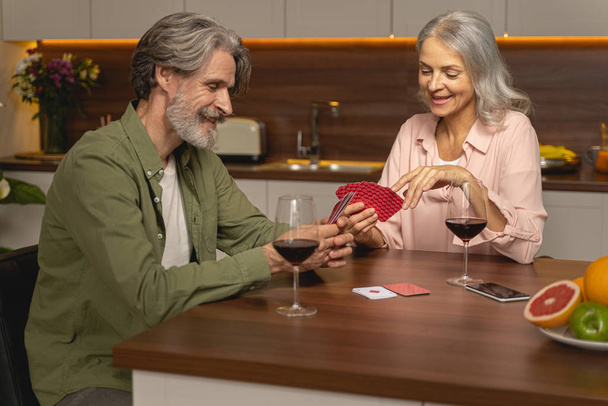 Male playing a game with his wife - Photo, Image