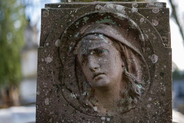 Lviv, Ukraine - December , 2019 : Lychakiv Cemetery, historic cemetery with many architectural monuments of 18-20 centuries and graves of cultural and scientific figures of Ukraine and Poland - Photo, image