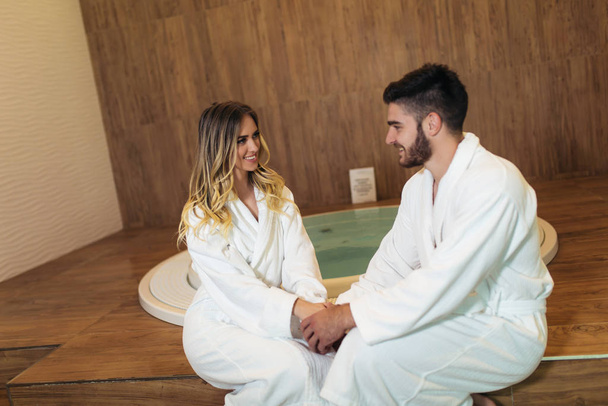 Portrait of attractive couple in spa center - Foto, Imagen