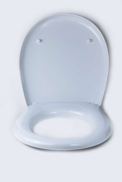 on a white background, a toilet lid. close-up. isolation. - Photo, Image