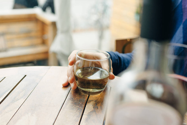 Glass of white wine on vintage wooden table - Zdjęcie, obraz