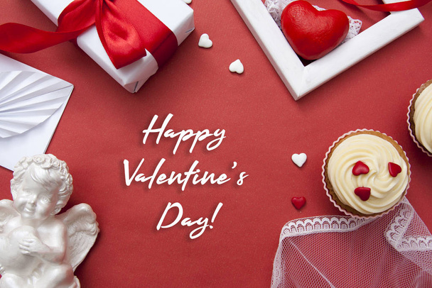 Greeting card with text Happy Valentine's day. Gift, cupcakes, h - Zdjęcie, obraz