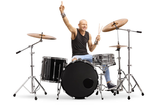 Male musician with a drum kit - Valokuva, kuva