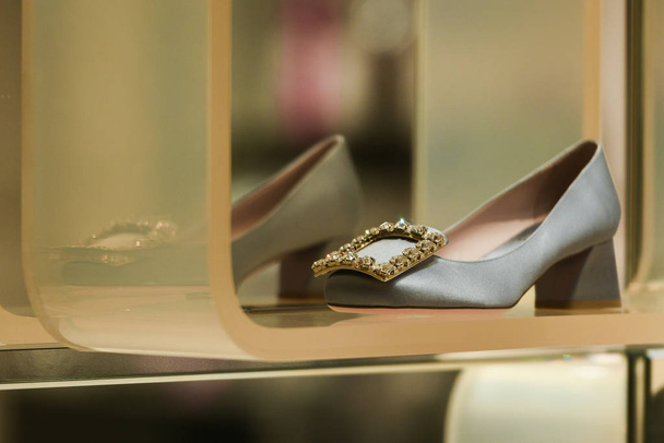 Milan, Italy - February 22, 2019:  Roger Vivier satin shoes in a store in Milan, February 2019. - Fotografie, Obrázek