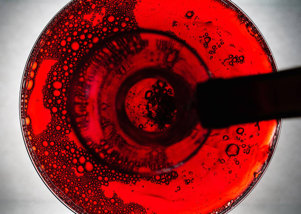 Red wine pouring in decanter - Φωτογραφία, εικόνα