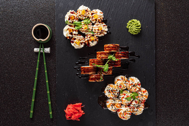 sushi on the black background - Photo, image