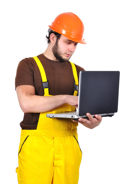 builder holding laptop - Foto, Imagem