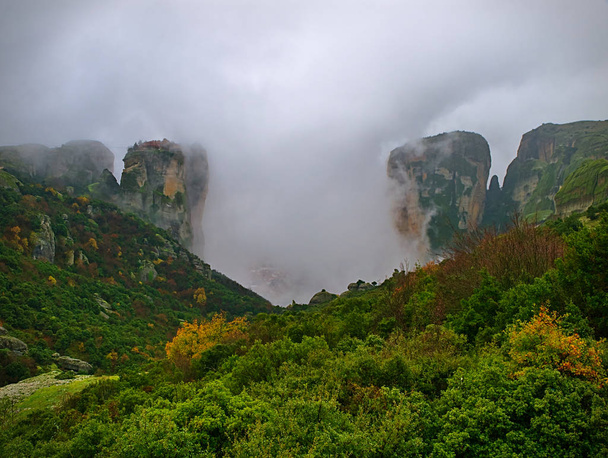 Meteora, Greece, winter dramatic landscape with heavy clouds and - Photo, Image
