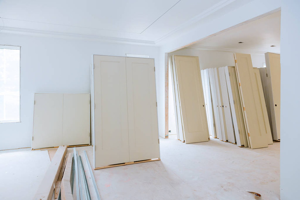 Apartment remodeling under construction installing material new home for repairs - 写真・画像