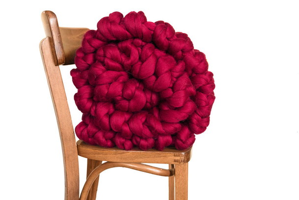 Giant red plaid blanket woolen nitted on woden stool chair - Foto, Imagem