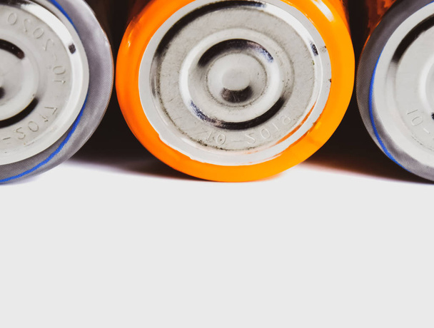 Salt and alkaline batteries, source of energy for portable technology. AAA and AA batteries - Photo, Image