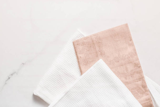 Kitchen textile on chic white marble background, napkin and towe - 写真・画像