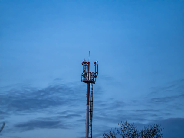 Mobile communications tower on the background of the night sky. - Photo, Image