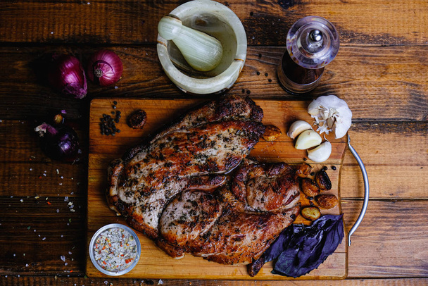 roasted ham composition on a wooden background - Foto, immagini