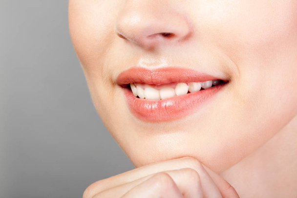 Perfect natural smiled lips makeup close-up - Fotó, kép