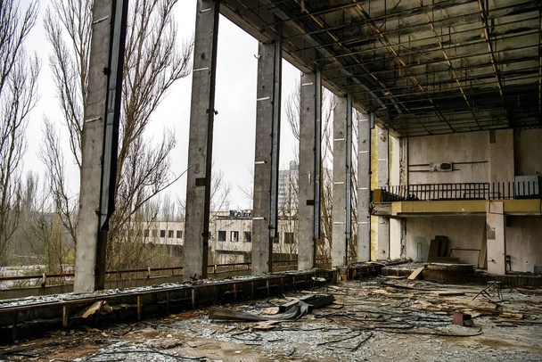 Interior of Palace of Culture in Prypiat in exclusion zone, near Chernobyl nuclear power plant, Ukraine. December 2019 - Fotoğraf, Görsel