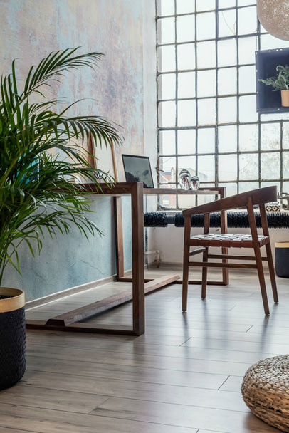 Contemporary unique design of wooden table in modern apartment - Fotoğraf, Görsel