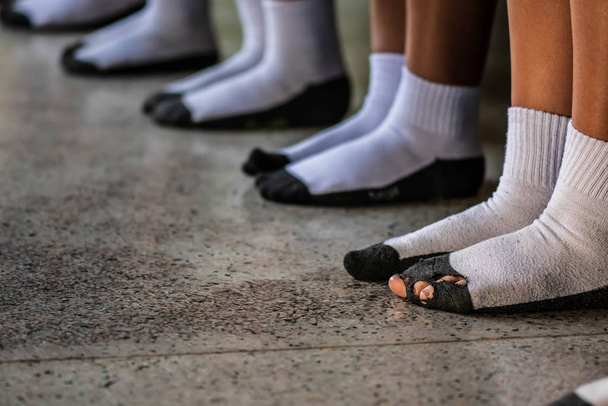 The difference of white - black socks of students. - Photo, Image